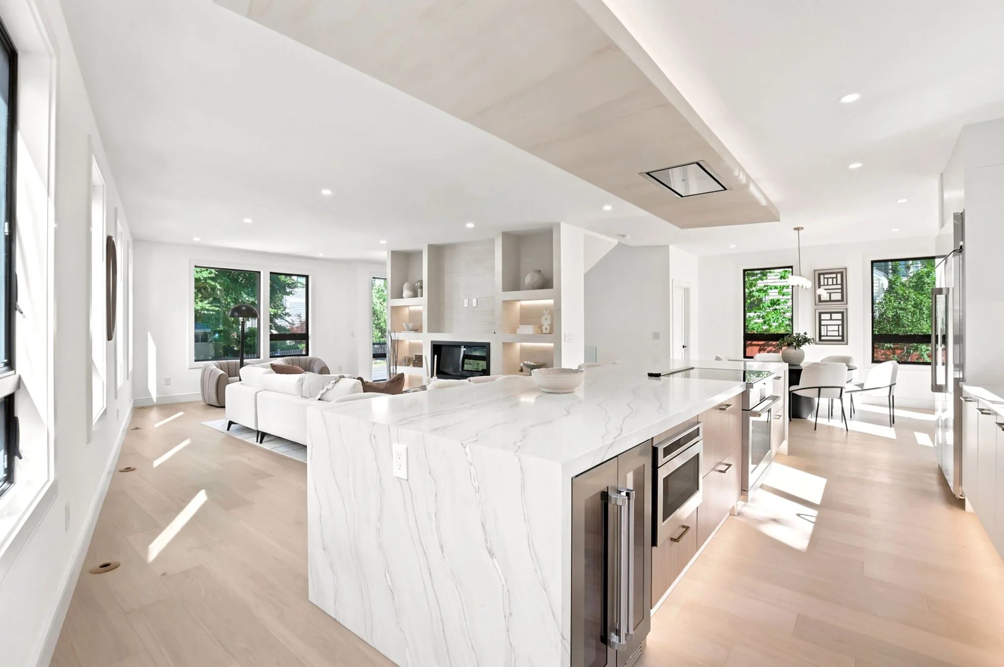 Chef’s kitchen with an oversized marble waterfall island